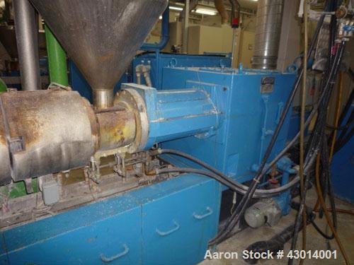 Used Berstoff Twin Screw Extruder, type ZE60A-33D, Co-rotating. Max screw speed 500 RPM via a Flender gearbox, ratio 5:1 by a 150KW/225HP-2500 RPM-380volt/50cycle/3Ph motor. incl. 2 x side feeder and...