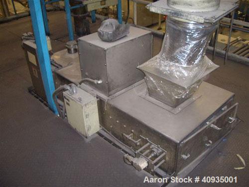 Used Twin Screw Extruder, 83 mm, 10 Barrels. Electrically heated and water cooled. 200 hp DC/SCR drive. Complete temp control panel. (1) ZSB 70 side feeder. Mfg 2004. Multi hole strand die.