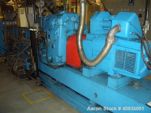 Used Twin Screw Extruder, 83 mm, 10 Barrels. Electrically heated and water cooled. 200 hp DC/SCR drive. Complete temp control panel. (1) ZSB 70 side feeder. Mfg 2004. Multi hole strand die.