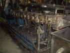 Used Twin Screw Extruder 90/92 mm. 12 barrel design. 4.997 gearbox ratio. 350 rpm output. 400 hp DC/SCR drive. Complete temp control panel. (2) ZSB 70mm side feeders. Multi hole strand die.