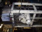 Used Twin Screw Extruder 90/92 mm. 12 barrel design. 4.997 gearbox ratio. 350 rpm output. 400 hp DC/SCR drive. Complete temp control panel. (2) ZSB 70mm side feeders. Multi hole strand die.