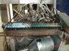 USED: APV 15MM lab size twin screw extruder, model MP2015. Co-rotating screw design. Electrically heated, water cooled barrel. Feed hopper with an accurate feeder. Driven by a 3/4 hp, 90 volt, 1725 r...