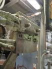 Used APV Baker Perkins 80mm Twin Screw Extruder, Model MP 2080.  DC Motor 150HP.  New PIV gearbox.  Includes; Schenck Accurate 902M Series Feeder, Steel Belt Systems Cooling Belt, Controls and Drive ...