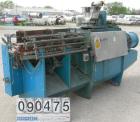 Used: APV twin screw extruder, 50mm screw diameter, model MPF50. Approximately 25:1 L/D ratio. Co-rotating screw design. 4 zone top vented electrically heated, water cooled split design barrel. (1) f...