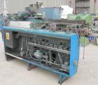 Used: APV twin screw extruder, 50mm screw diameter, model MPF50. Approximately 25:1 L/D ratio. Co-rotating screw design. 4 zone top vented electrically heated, water cooled split design barrel. (1) f...