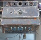 Used APV Twin Screw Extruder, 50mm screw diameter. Approximately 15 to 1 L/D ratio. Co-rotating screw design. Vented, electrically heated, water cooled barrel. (1) Feed section. Driven by an 18.5 kw ...