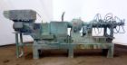 Used Baker Perkins 125mm MP Series Twin Screw Extruder. Approximate L/D ratio. Co-rotating screw design. Clamshell design liquid heated, and cooled barrel. Feed section, no hopper. Approximate 55-1/2...