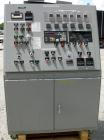 Used Baker Perkins Twin Screw Extruder, 50 MM Screw Diameter, Model MP2050. Approximate 25:1 L/D ratio. Co-rotating screw design. Clamshell design, 5 zone electrically heated, water cooled barrel sec...