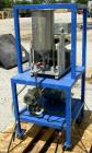 Used Baker Perkins Twin Screw Extruder, 50 MM Screw Diameter, Model MP2050. Approximate 25:1 L/D ratio. Co-rotating screw design. Clamshell design, 5 zone electrically heated, water cooled barrel sec...