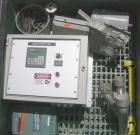 Used Baker Perkins Twin Screw Extruder, 50 MM Screw Diameter, Model MP2050. Approximate 25:1 L/D ratio. Co-rotating screw design. Clamshell design, 5 zone electrically heated, water cooled barrel sec...