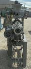 Used Berstorff 25mm Twin Screw Extruder, type ZE25, co-rotating intermeshing side by side screw design. Approximate 33 to 1 L/D ratio. 6 barrel sections, 1 feed section with a top mounted K-Tron type...
