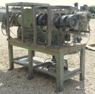Used Berstorff 25mm Twin Screw Extruder, type ZE25, co-rotating intermeshing side by side screw design. Approximate 38 to 1 L/D ratio. 7 barrel sections, 1 feed section, (1) 2 hole strand die. Electr...