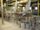 Used Berstorff Twin Screw Extrusion System consisting of: (1) Berstorff 60 mm twin screw extruder, model ZE60A35, approximate 30:1 L/D ratio, side by side co-rotating screws, (7) barrel zones, electr...