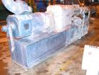 Used Berstorff Twin Screw Extrusion System consisting of: (1) Berstorff 60 mm twin screw extruder, model ZE60A35, approximate 30:1 L/D ratio, side by side co-rotating screws, (7) barrel zones, electr...