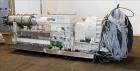 Used Berstorff 75mm Twin Screw Extruder, Model ZE75A. 4 barrel Zone electrically heated, water cooled system including pump and heat exchanger. Approximate 2.95