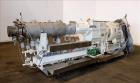 Used Berstorff 75mm Twin Screw Extruder, Model ZE75A. 4 barrel Zone electrically heated, water cooled system including pump and heat exchanger. Approximate 2.95