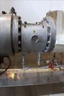 Used Berstorff 75mm Twin Screw Extruder, Model ZE75A. 4 barrel Zone electrically heated, water cooled system including pump and heat exchanger. Approximate 2.95