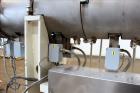 Used Berstorff 75mm Twin Screw Extruder, Model ZE75A. 4 barrel Zone electrically heated, water cooled system including pump and heat exchanger. Approximate 2.95