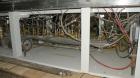 Used Entek 73 mm Co-Rotating Twin Screw Extruder, Model E-MAX 73MM 48L/D, 48 to 1 L/D ratio. (11) Barrel sections electrically heated, water cooled with system including pump, heat exchanger, and hol...