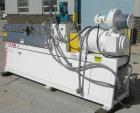 Used Farrel 37mm Co-Rotating Twin Screw Extruder, Model FTX80H. Co-rotating screw design. Approximately 40 to 1 L/D ratio. 9 barrel segments, 1 feed section, no hopper. Electrically heated, water coo...