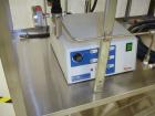 Used Haake Twin Screw Extruder, Model MINILAB. Co-rotating conical screws, electrically heated, water cooled barrel, with Thermo Fischer force feeder with minilab controller, serial #1200502065001.