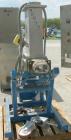 USED: K-tron twin screw side feeder, 80 mm, type K-T80-SF. Includes hopper. Driven by a 4kw (5.3 hp), 3/50/380/480 volt, 1440/1740 rpm geaarmotor, ratio 11.18 to 1. mounted on a carbon steel frame wi...