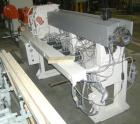 Used Maris 40 MM Twin Screw Extruder, Model TM40WW. Approximately 40:1 L/D ratio. Co-rotating screw design. 9 barrel sections measuring from the back of the feed barrel to end barrel is 62