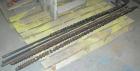 Used Maris 40 MM Twin Screw Extruder, Model TM40WW. Approximately 40:1 L/D ratio. Co-rotating screw design. 9 barrel sections measuring from the back of the feed barrel to end barrel is 62