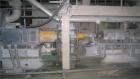 Used Maris Twin Screw Extrusion Line, Type TM70W/020391. 70mm, 36:1 L/D. Electrically heated, water cooled. Max screw speed 525 via a gearbox by a 180 kW-400 volt/50 cycle/3 ph main motor. Frame moun...