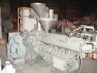 USED: NPC approximate 50mm twin screw extruder, model DMG50. Top vented barrel, electrically heated, water cooled, with tank, pump and heat exchanger. Water cooled feed throat with an approximate 1.5...