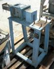 USED: Werner Pfleiderer twin screw side feeder, model ZSB-40. Unit requires 2 shafts and motor. Last used with a 58mm extruder. Mounted on a carbon steel stand. Built 1988.