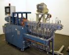 Used Coperion Werner Pfleiderer 25mm Twin Screw Extruder, Type ZSK-25. Manufactured New 2002. Approximate 40 to 1 L/D ratio. Co-Rotating intermeshing side by side screw design. 12 total Barrel sectio...