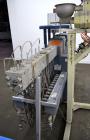 Used Coperion Werner Pfleiderer 25mm Twin Screw Extruder, Type ZSK-25. Manufactured New 2002. Approximate 40 to 1 L/D ratio. Co-Rotating intermeshing side by side screw design. 12 total Barrel sectio...