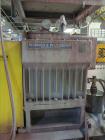 Used Werner & Pfleiderer 58mm Twin Screw Extruder, Model ZSK-58, Serial # 180913.  75 HP DC motor.  Includes:  North American Process Cooling Belt, 902M series feeder, long barrel.  Controls and Driv...