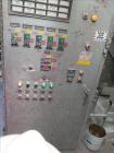 Used Werner & Pfleiderer 58mm Twin Screw Extruder, Model ZSK-58, Serial # 180913.  75 HP DC motor.  Includes:  North American Process Cooling Belt, 902M series feeder, long barrel.  Controls and Driv...