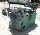 USED: Werner Pfleiderer lab size twin screw extruder. 30 mm screw diameter, model ZSK30M0/2P. Approx 30:1 L/D ratio. Co-rotating screw design. 9 zone electrically heated, water cooled barrel. Driven ...