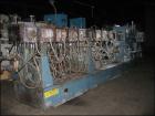 USED: Werner Pfleiderer twin screw extruder, type ZSK70. 70 mmco-rotating segmented screws, 30:1 L/D with (1) feed section, (7)barrel sections and (2) vented sections, barrel extension with (4)barrel...