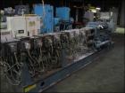 USED: Werner Pfleiderer twin screw extruder, type ZSK70. 70 mmco-rotating segmented screws, 30:1 L/D with (1) feed section, (7)barrel sections and (2) vented sections, barrel extension with (4)barrel...
