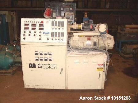 Used 40mm American Maplan Conical Counter Rotating Twin Screw Extruder, Model Con-40.  15 Hp DC motor with SCR. Electrically heated with 4 barrel zones and 3 die zones. Air cooled with hopper and 1 h...