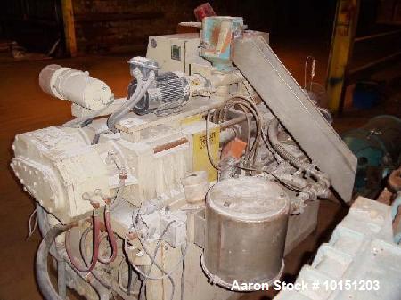 Used 40mm American Maplan Conical Counter Rotating Twin Screw Extruder, Model Con-40.  15 Hp DC motor with SCR. Electrically heated with 4 barrel zones and 3 die zones. Air cooled with hopper and 1 h...