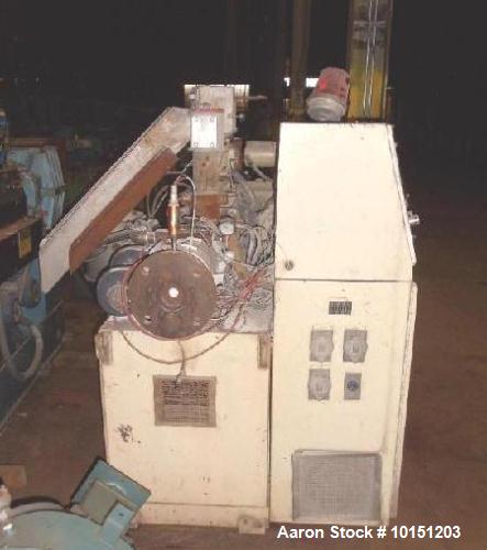 Used 40mm American Maplan Conical Counter Rotating Twin Screw Extruder, Model Con-40.  15 Hp DC motor with SCR. Electrically heated with 4 barrel zones and 3 die zones. Air cooled with hopper and 1 h...