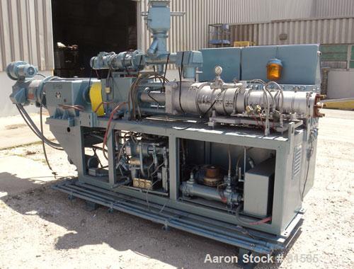 Used American Maplan Approximate 62mm Counter-Rotating Twin Screw Extruder, Model DSK62. (2) 2.44" Diameter x 48" long intermeshing tapered screws. Electrically heated, water cooled 4 zone vented bar...