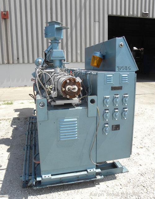 Used American Maplan Approximate 62mm Counter-Rotating Twin Screw Extruder, Model DSK62. (2) 2.44" Diameter x 48" long intermeshing tapered screws. Electrically heated, water cooled 4 zone vented bar...