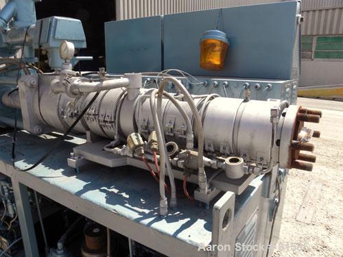 Used American Maplan Approximate 62mm Counter-Rotating Twin Screw Extruder, Model DSK62. (2) 2.44" Diameter x 48" long intermeshing tapered screws. Electrically heated, water cooled 4 zone vented bar...