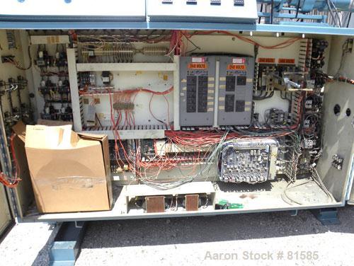 Used American Maplan Approximate 62mm Counter-Rotating Twin Screw Extruder, Model DSK62. (2) 2.44" Diameter x 48" long intermeshing tapered screws. Electrically heated, water cooled 4 zone vented bar...