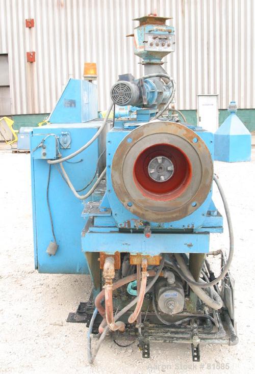 Used American Maplan Approximate 62mm Counter-Rotating Twin Screw Extruder, Model DSK62. (2) 2.44" Diameter x 48" long intermeshing tapered screws. Electrically heated, water cooled 4 zone vented bar...