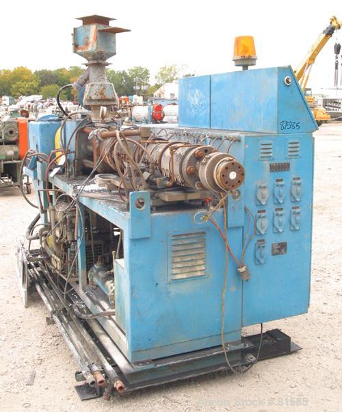 Used American Maplan Approximate 62mm Counter-Rotating Twin Screw Extruder, Model DSK62. (2) 2.44" Diameter x 48" long intermeshing tapered screws. Electrically heated, water cooled 4 zone vented bar...