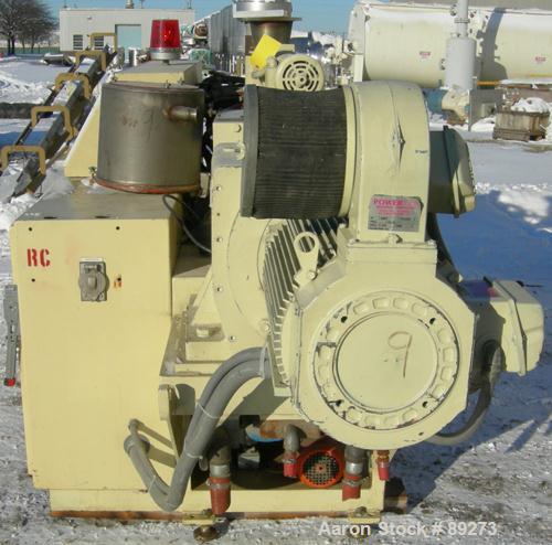 USED: American Maplan conical counter-rotating twin screw extruder, 62 mm, model DSK62. Approximate 47.1:1 gearbox ratio. Built-in oil heating and cooling with tank, heat exchanger and pump. 4 zone t...
