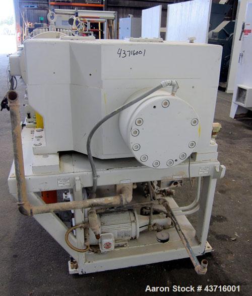 Used American Maplan 110mm Counter-Rotating Twin Screw Extruder, Model TS-110.  Approximate 26 to 1 L/D ratio.  Top vented barrel with electrically heated 1 and 2 barrel zones, zones 3, 4, and 5 offe...
