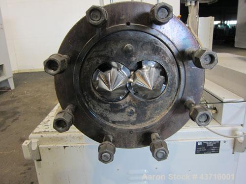 Used American Maplan 110mm Counter-Rotating Twin Screw Extruder, Model TS-110.  Approximate 26 to 1 L/D ratio.  Top vented barrel with electrically heated 1 and 2 barrel zones, zones 3, 4, and 5 offe...
